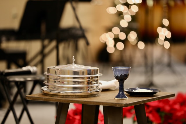 communion cup and plate set at altar